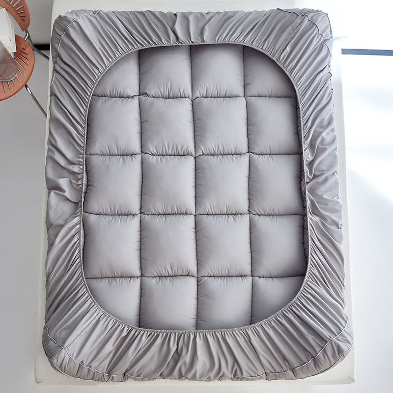 WolkenTopper in Grey laid out, showing the 360° elastic skirt