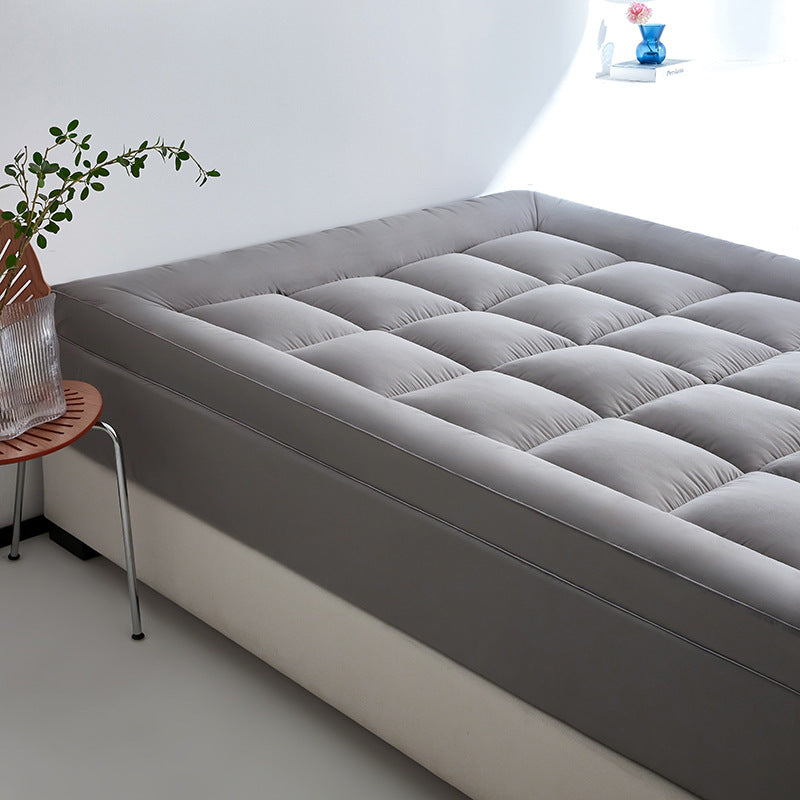 WolkenTopper in Grey in a bright bedroom